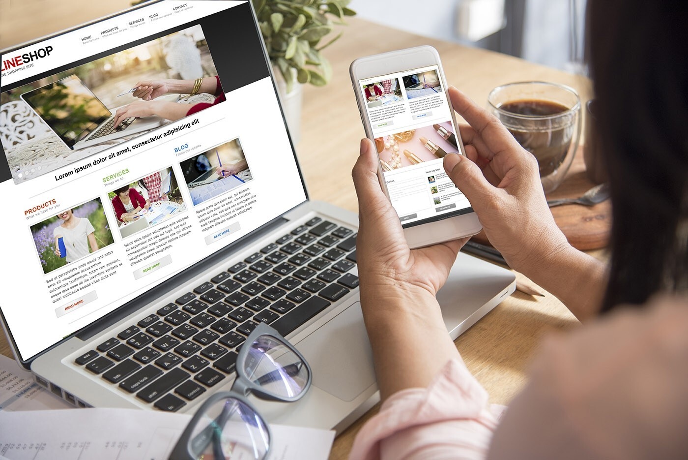 Woman searches mobile friendly website on cell phone while having laptop open to same site in background