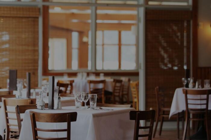 Dimly lit restaurant dining room