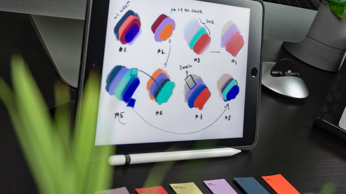 Tablet with different color swatches and designs on screen