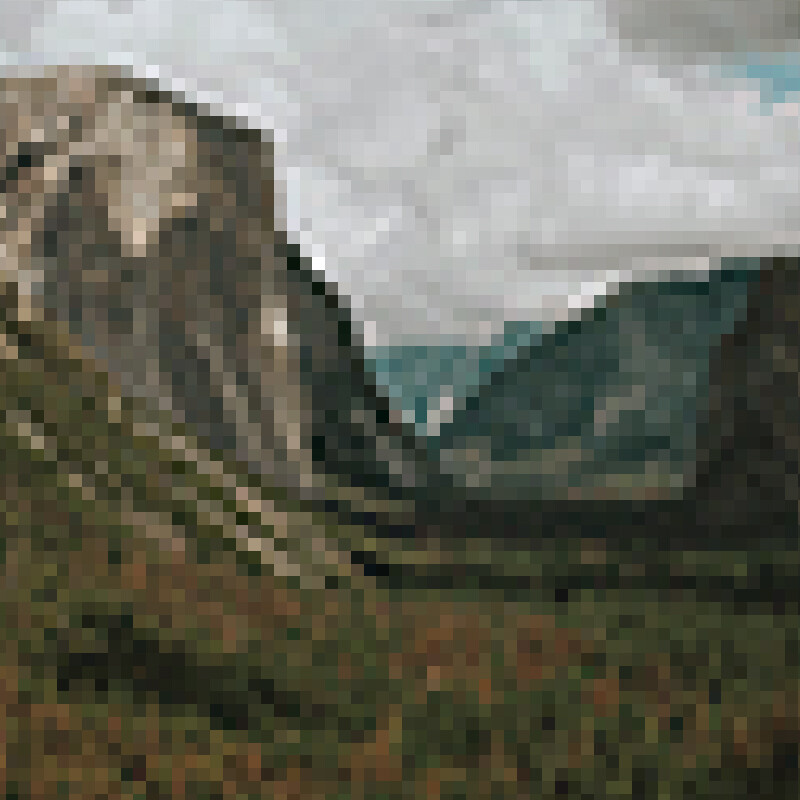 Blurry pixelated image of mountain landscape