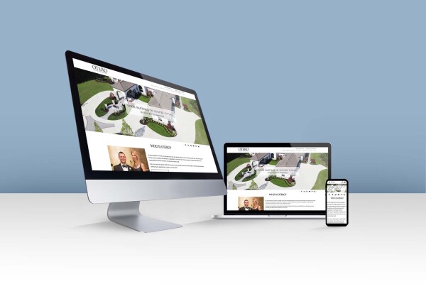 Otero Homes award-winning website by Alt Media Studios displayed across a desktop monitor, a laptop, and a smartphone