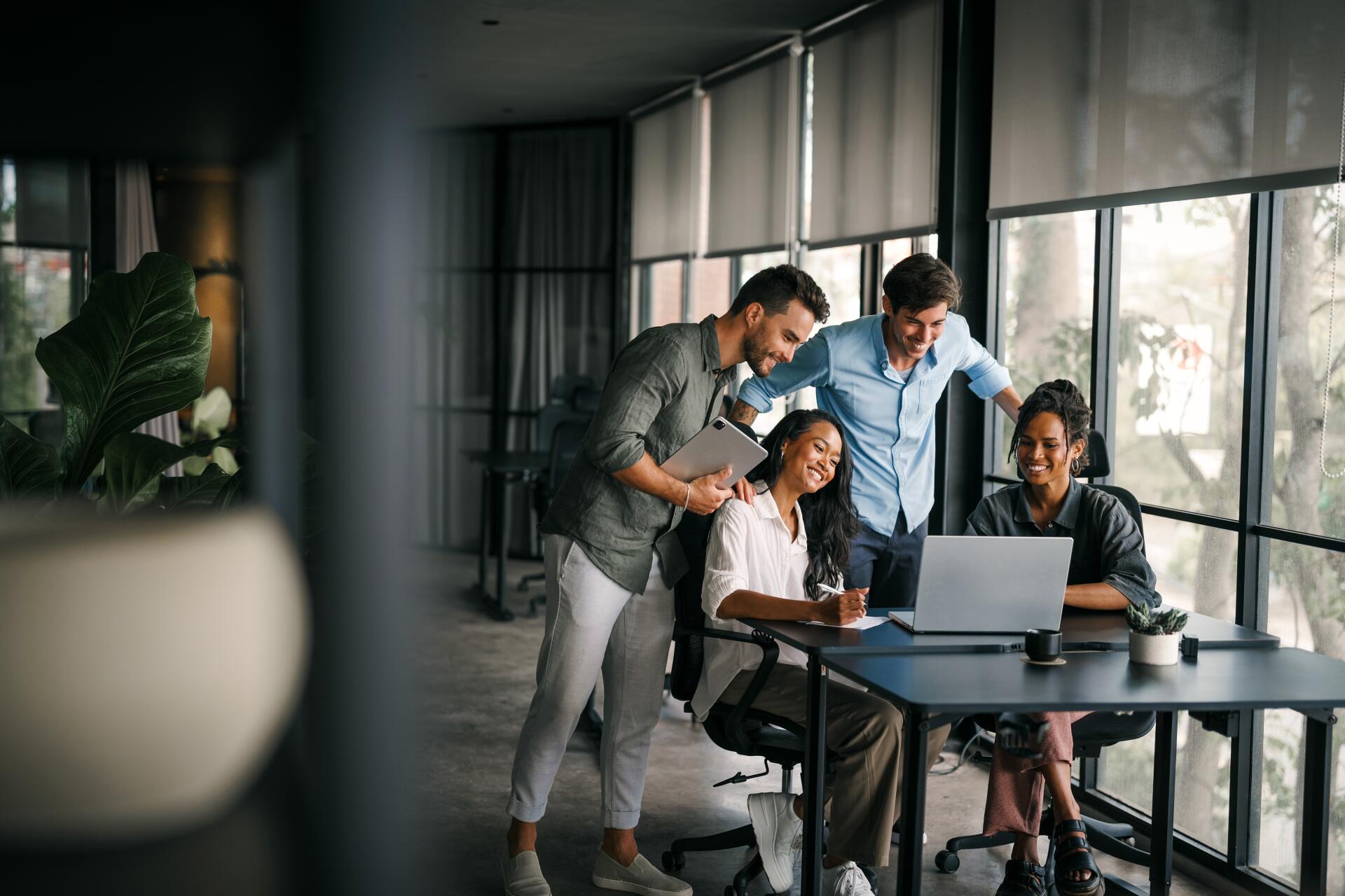Coworkers discussing notes
